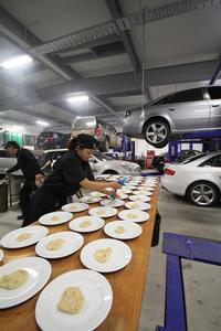 The Flying Trestles team on location in the Queenstown Motor Group workshop